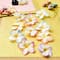12 Packs: 14 ct. (168 total) Paper Plumeria Embellishments by Recollections™